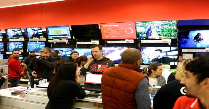 FILE PHOTO: Customers shop during Black Friday sales at a Target store in Chicago