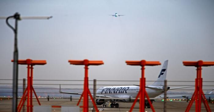 An airplane from Finnair prepares to take-off at Cointrin airport in Geneva