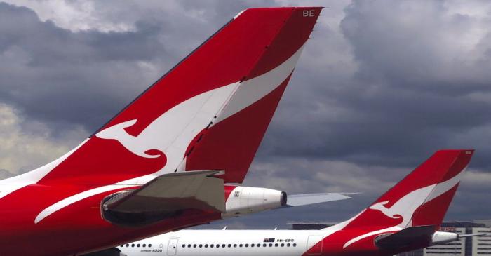 Two Qantas Airways Airbus A330 aircraft can be seen on the tarmac near the domestic terminal at