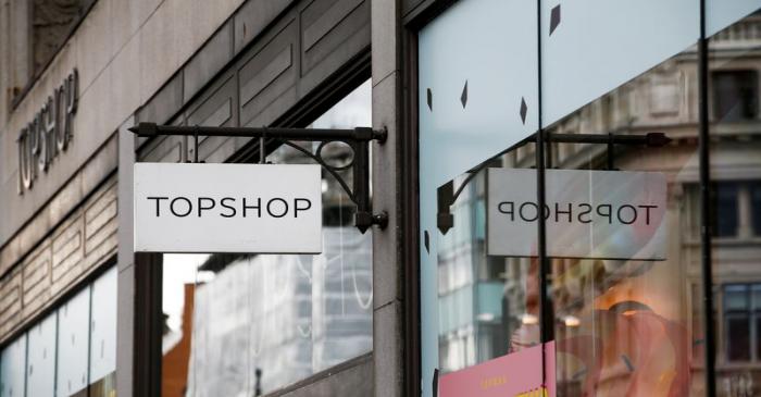 Signage can be seen outside a Topshop and Topman store, owned by Arcadia Group, in central