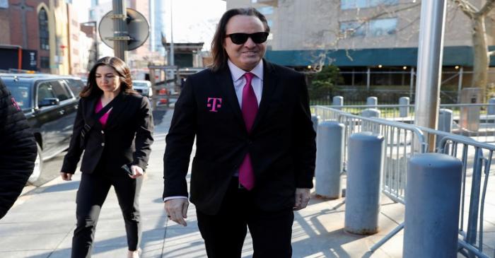 T-Mobile US Inc Chief Executive Officer John Legere arrives at Manhattan Federal Court during