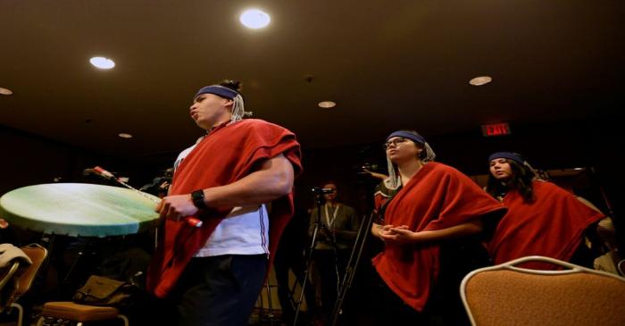 Coast Salish drummers and First Nations chiefs attend a briefing in Vancouver