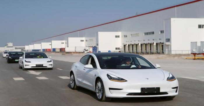 China-made Tesla Model 3 vehicles are seen at the Shanghai Gigafactory of the U.S. electric car