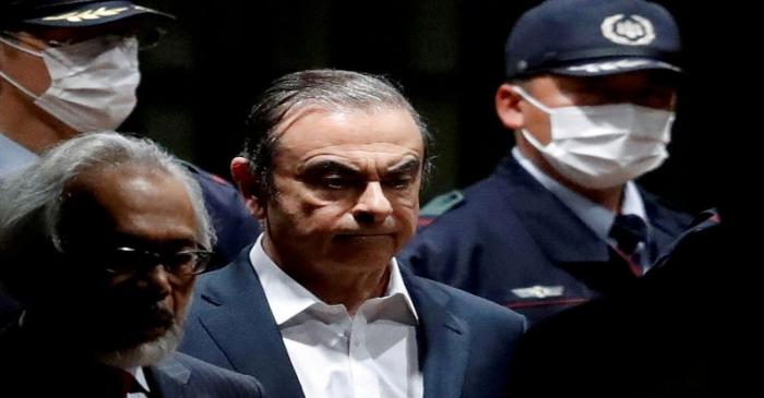 FILE PHOTO: Former Nissan Motor Chariman Carlos Ghosn leaves the Tokyo Detention House