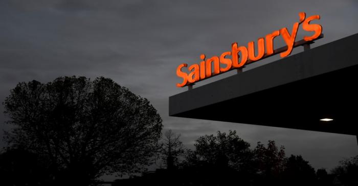 FILE PHOTO: Sainsbury's signage is seen at a supermarket and petrol station in west London,