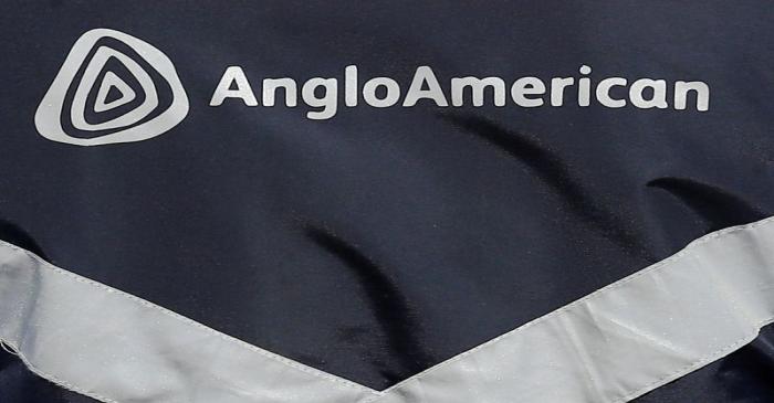 FILE PHOTO: Logo of Anglo American is seen on a jacket of an employee at the Los Bronces copper
