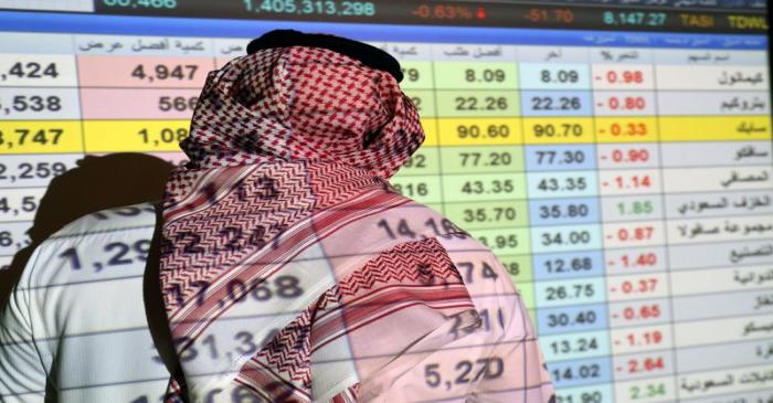 A Saudi trader monitors stocks at the Saudi stock market in Riyadh