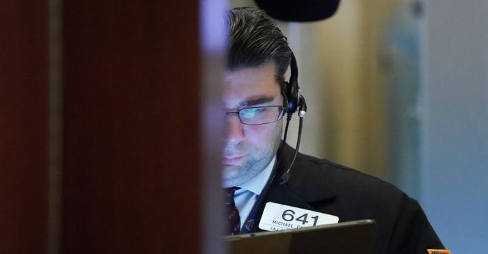 Trader works at the New York Stock Exchange