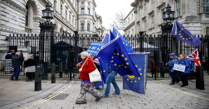 Anti-Brexit protesters are seen in front of Downing Street in London