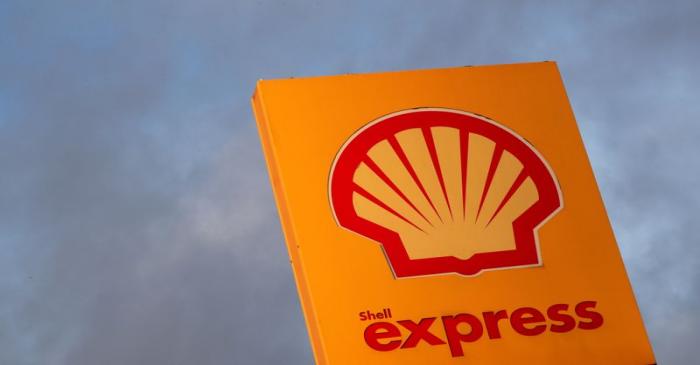 FILE PHOTO: The logo of Royal Dutch Shell is seen at a petrol station in Sint-Pieters-Leeuw