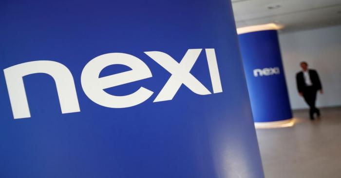 FILE PHOTO: The logo of Italian payments group Nexi is pictured inside their headquarters in