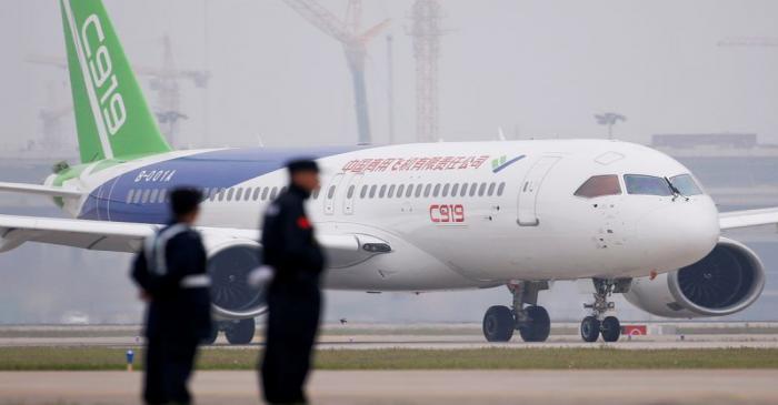 FILE PHOTO: China's home-grown C919 passenger jet taxis after landing on its maiden flight at