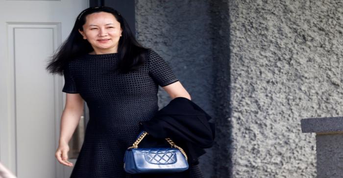 FILE PHOTO: Huawei's Financial Chief Meng Wanzhou leaves her family home in Vancouver, British