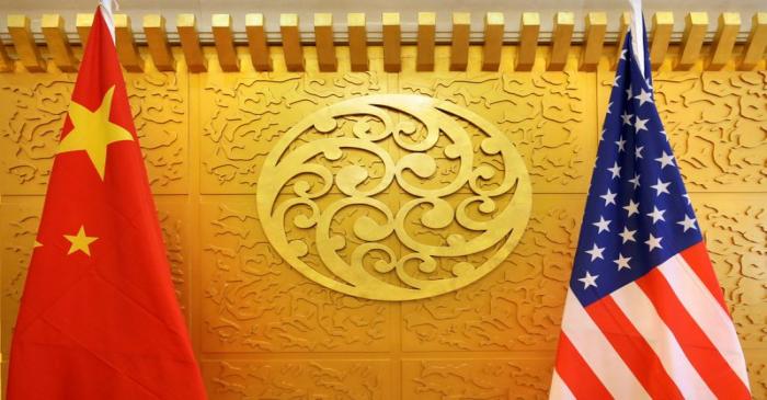FILE PHOTO: Chinese and U.S. flags are set up for a meeting during a visit by U.S. Secretary of