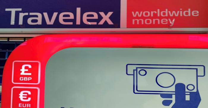 Signage is seen above a Travelex ATM at Manchester Airport in Manchester