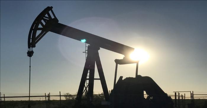 FILE PHOTO: A pump jack is seen at sunset near Midland