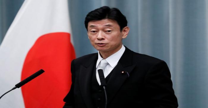 Japan's Economy Minister Nishimura attends a news conference at PM Abe's official residence in