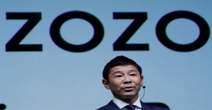 FILE PHOTO: FILE PHOTO : Japanese billionaire Yusaku Maezawa speaks at an event  in Tokyo,