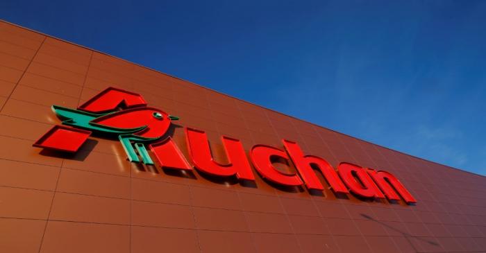 FILE PHOTO: The logo of Auchan is seen on the wall of an Auchan supermarket in Noyelles-Godault