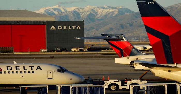 FILE PHOTO: A Delta Air Lines flight is pushed put of its gate at the airport in Salt Lake City