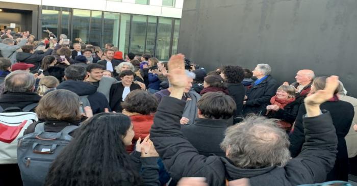 FILE PHOTO: Supporters of 12 climate activists celebrate after the non guilty verdict of the