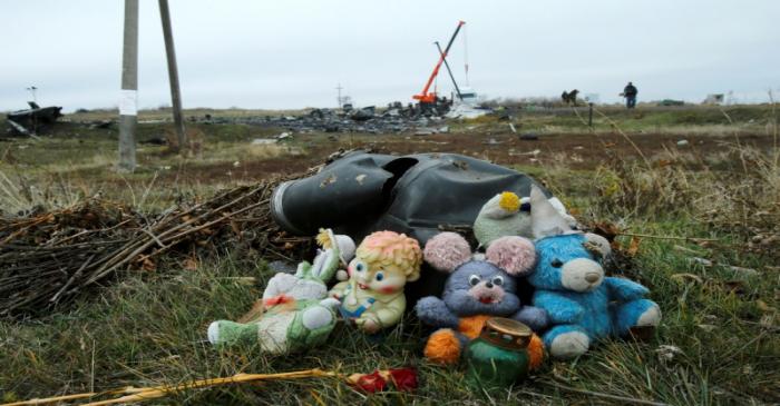 FILE PHOTO: Soft toys are seen near the crash site of the Malaysia Airlines Boeing 777 plane