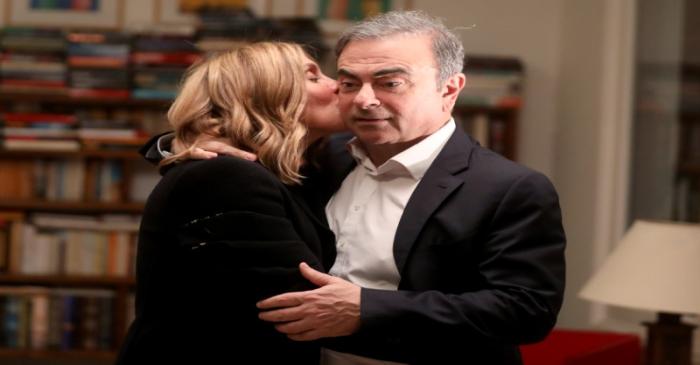 Former Nissan chairman Carlos Ghosn and his wife Carole Ghosn pose for a picture after an