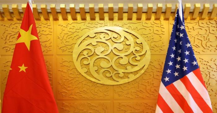 Chinese and U.S. flags are set up for a meeting during a visit by U.S. Secretary of