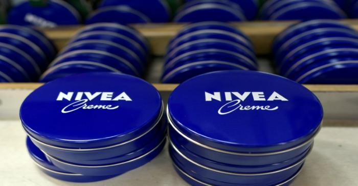 FILE PHOTO: Nivea tins are seen in a production line at the plant of German personal-care