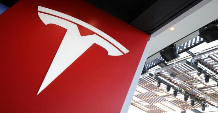 FILE PHOTO: A Tesla logo is seen in Los Angeles