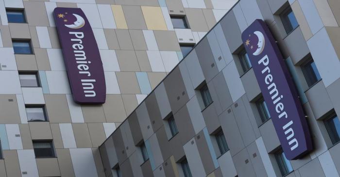 FILE PHOTO: Signage for Premier Inn is seen on the outside of one of their hotels in London,