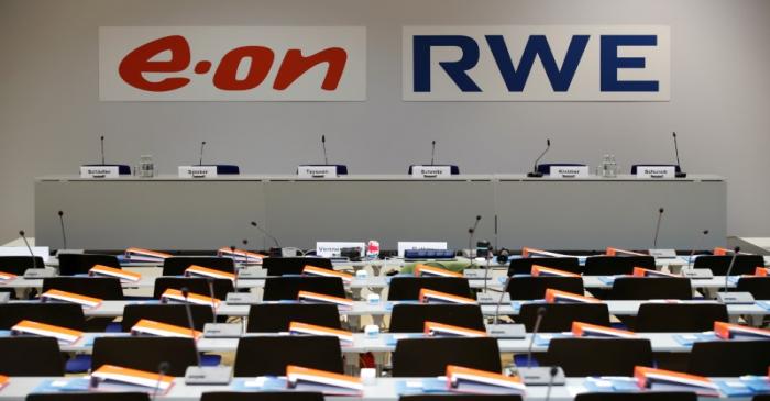 The logos of RWE and E.ON are seen before a joint news conference of the two German utilities