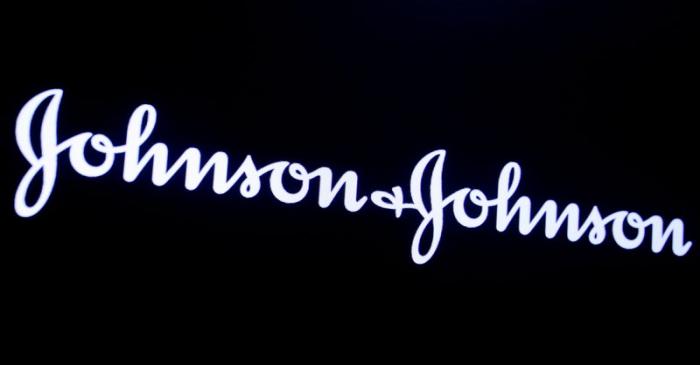 FILE PHOTO: The company logo for Johnson & Johnson is displayed on a screen to celebrate the