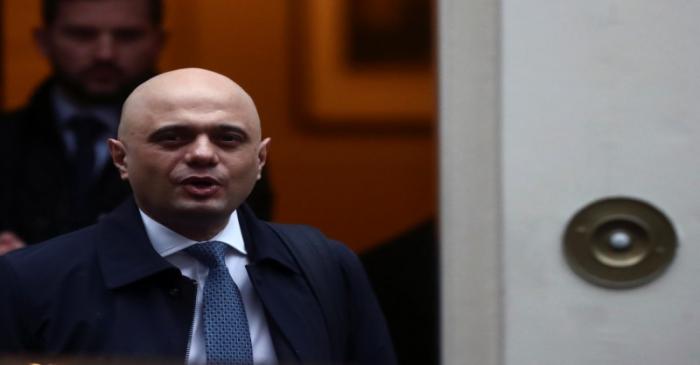 FILE PHOTO:  Britain's Chancellor of the Exchequer Sajid Javid walks at Downing Street in