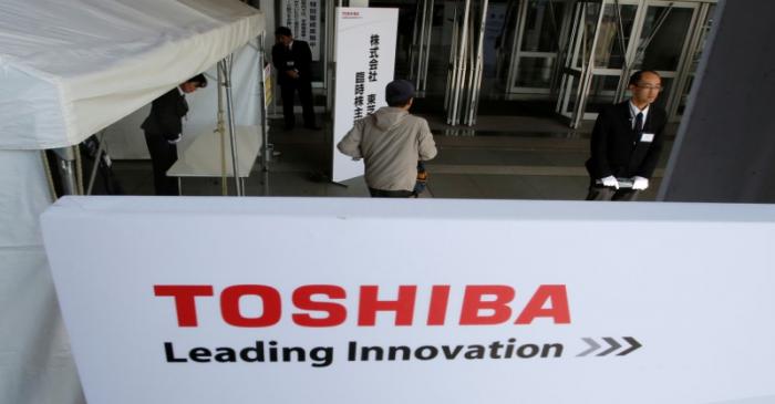 A shareholder arrives at Toshiba's extraordinary shareholders meeting in Chiba