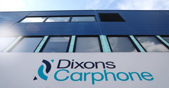 FILE PHOTO: A sign displays the logo of Dixons Carphone at the company headquarters in London