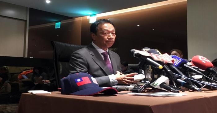 FILE PHOTO: Foxconn Technology Group founder Terry Gou attends a news conference before leaving