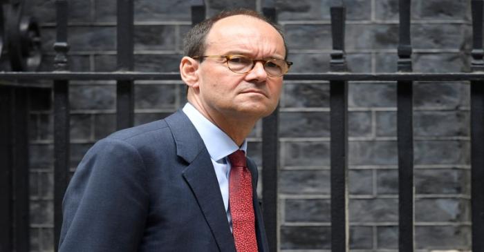 Mike Coupe, the CEO of Sainsbury's leaves 10 Downing Street in London