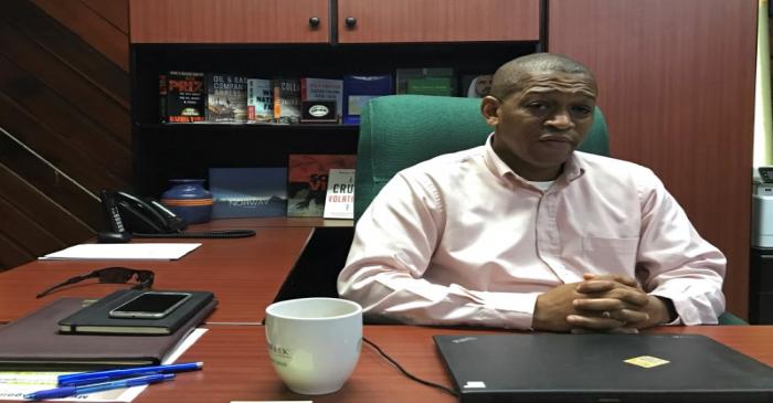 Mark Bynoe, the director of Guyana's Department of Energy, talks to Reuters in Georgetown