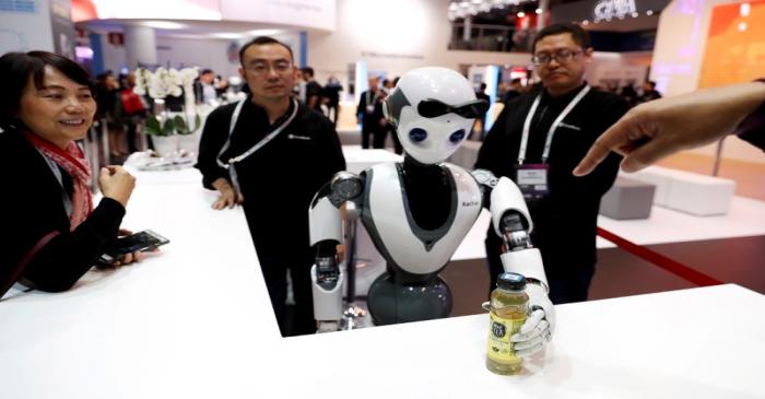FILE PHOTO: The CloudMinds XR-1 robot performs for the visitors at the Mobile World Congress in