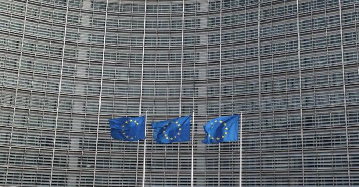 FILE PHOTO: European Union flags fly outside the European Commission headquarters in Brussels