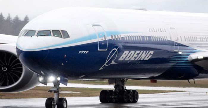 A Boeing 777X airplane taxis during an attempted first test flight from the company's plant in