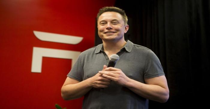 FILE PHOTO: Tesla CEO Elon Musk speaks about new Autopilot features during a Tesla event in
