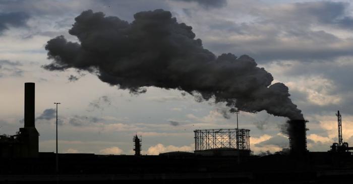 Smoke is seen coming out of a chimney at the Tata steel plant in Ijmuiden