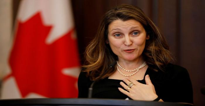 FILE PHOTO:  Canada's Deputy Prime Minister Chrystia Freeland speaks to media in the House of