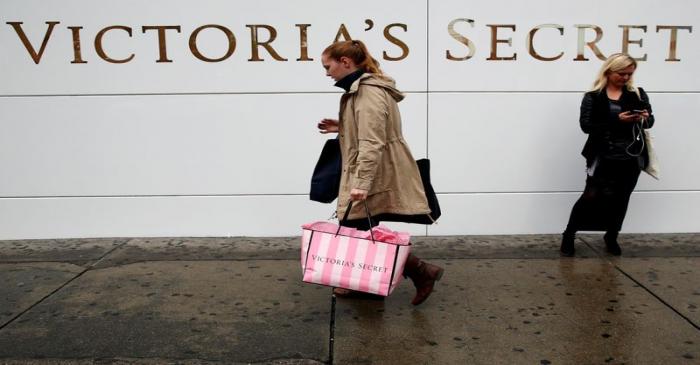 A customer passes by an L Brands Inc., Victoria's Secret retail store in Manhattan, New York