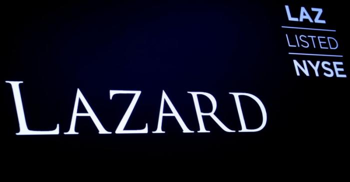 The logo and trading information for Lazard Ltd appear on a screen on the floor at theNYSE in