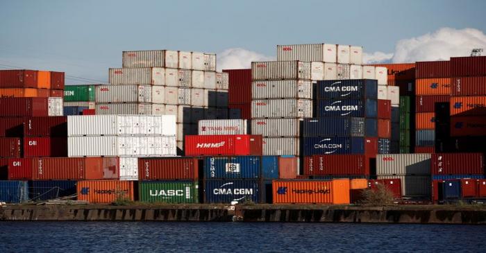 Shipping containers sit stacked in the Port of Le Havre