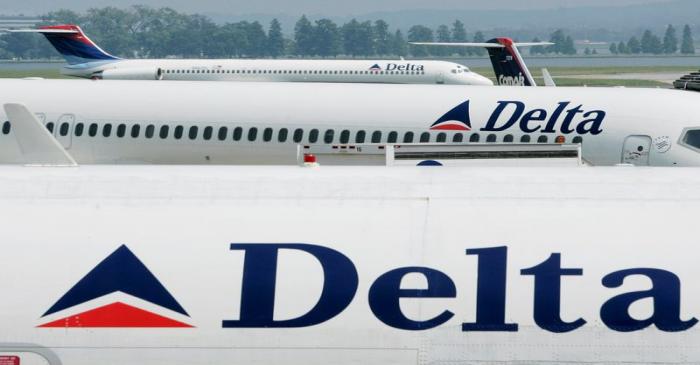 FILE PHOTO: Delta Airlines sit at Reagan National Airport outside Washington.