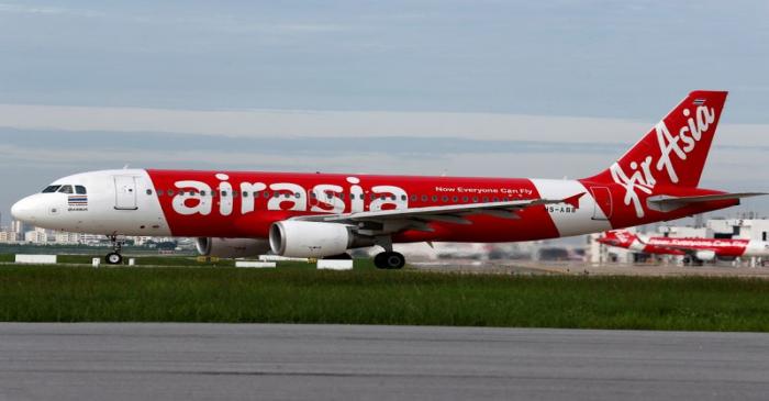 FILE PHOTO: Thai AirAsia Airbus A320 plane prepares for take off at Don Mueang International